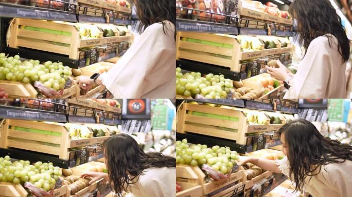 近镜头手年轻女子购物新鲜蔬菜