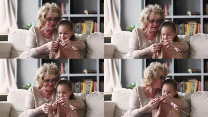 可爱的老奶奶教小孙女一起编织