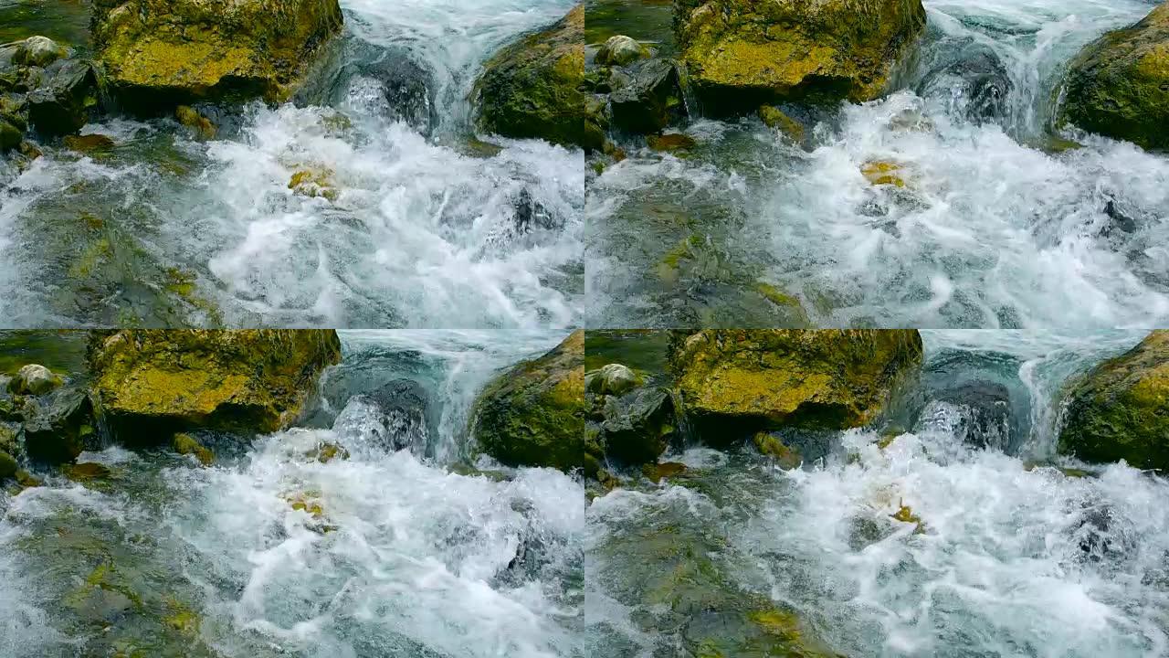 溪水落在山上山泉水清澈见底大自然
