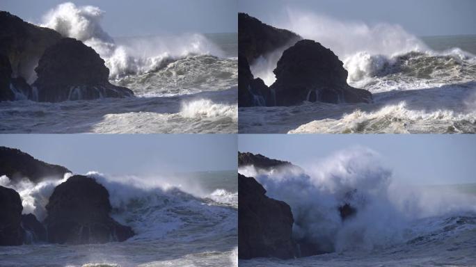 海洋风暴。惊涛骇浪打碎岩石。慢动作