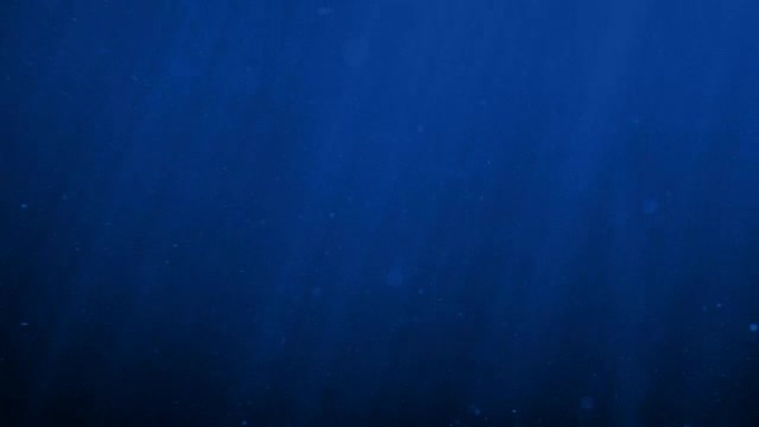 月光下的水下粒子光线波纹背景素材蓝色海洋