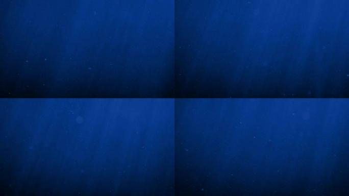 月光下的水下粒子光线波纹背景素材蓝色海洋