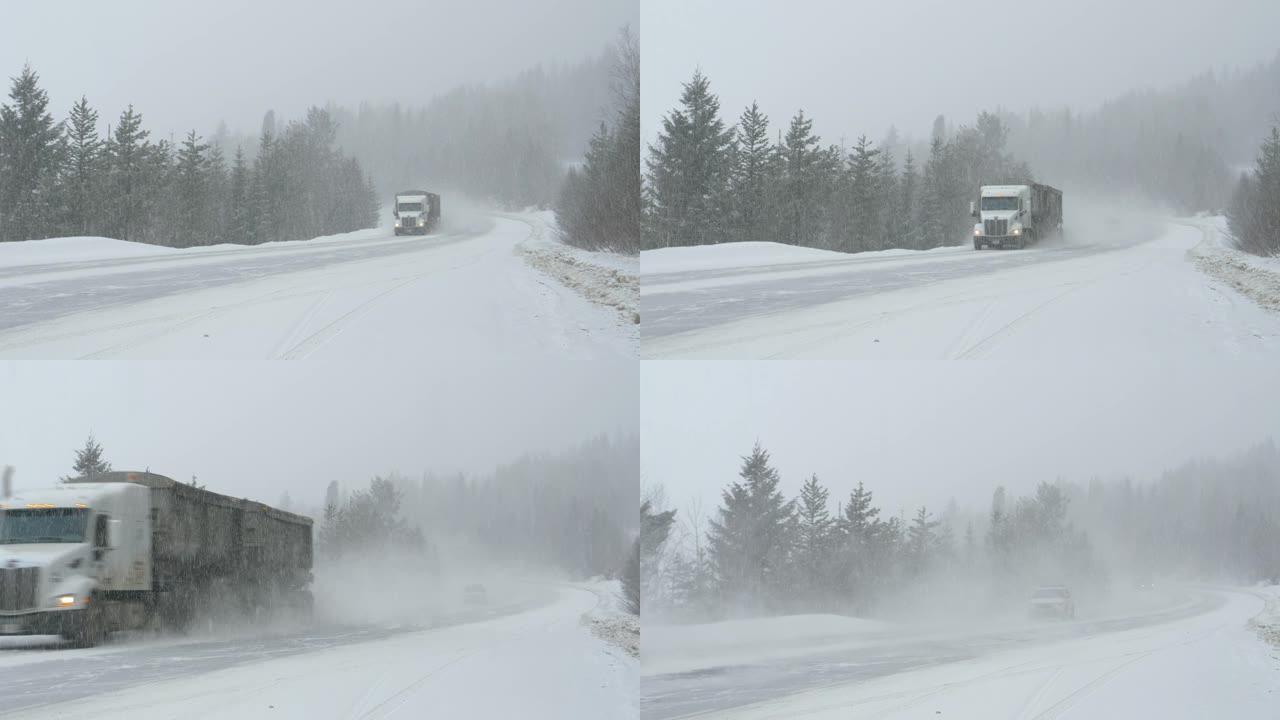 货运卡车引领其他车辆在暴风雪中行驶。