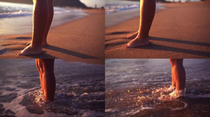 女人在日落时走向大海
