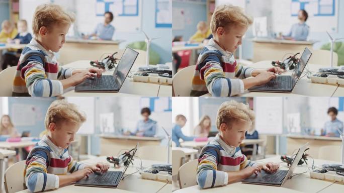 年轻的男生使用笔记本电脑为机器人工程课程编程软件。小学科学教室，有天才的才华横溢的孩子从事技术工作