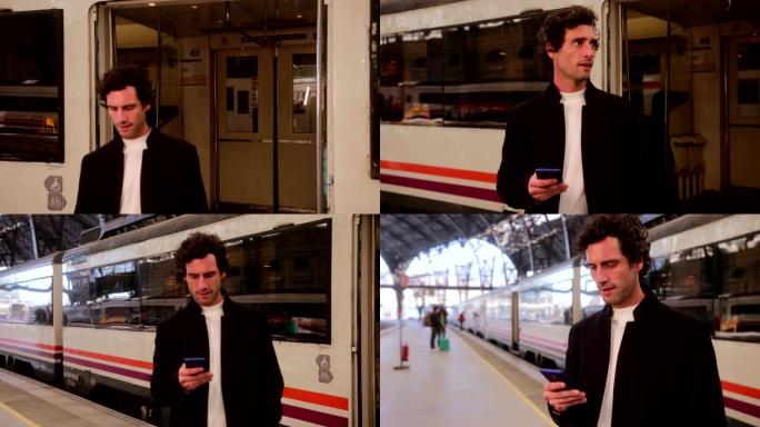 商人离开火车并在火车站检查智能手机
