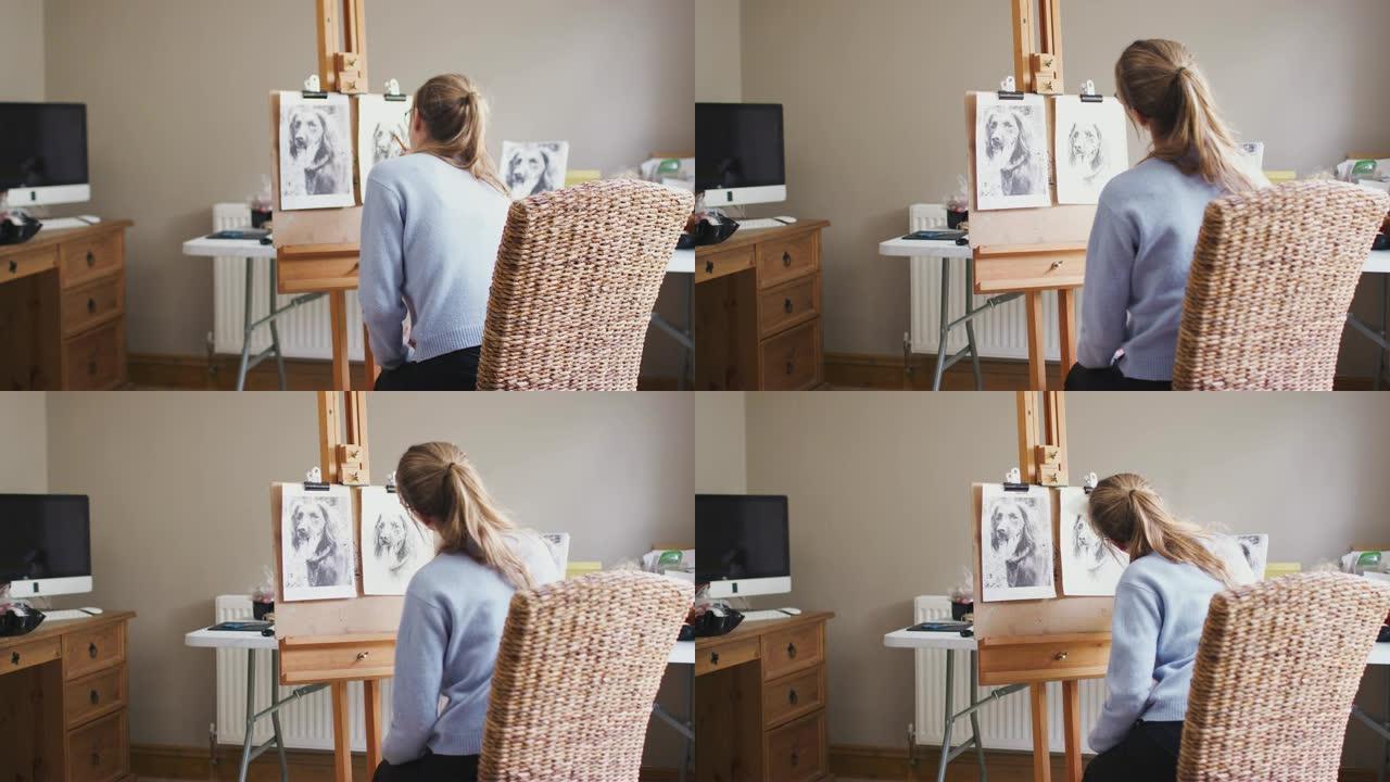 画架上的女少年艺术家的后视图，从木炭照片中绘制狗的照片