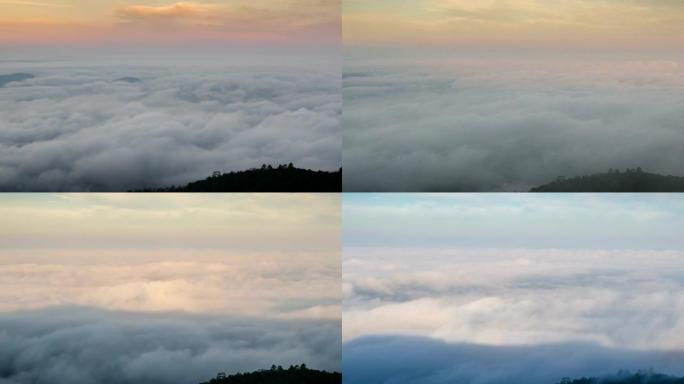 日出和多云的移动雾时间流逝在美丽的天空的山上自然，运动放大