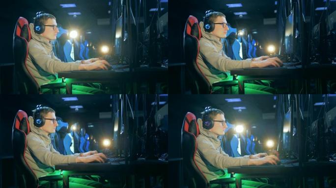 男人用电脑玩游戏。电子竞技网络游戏。