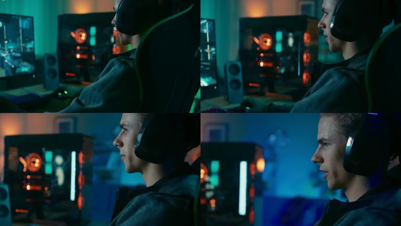 游戏玩家在他的个人电脑上戴着麦克风玩射击游戏在线视频游戏。他向其他玩家发出命令。房间和电脑有彩色霓虹