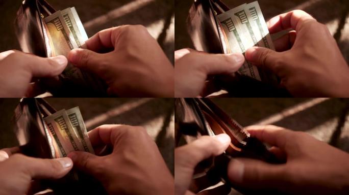 手指重新计算钞票本·富兰克林与标志100 $