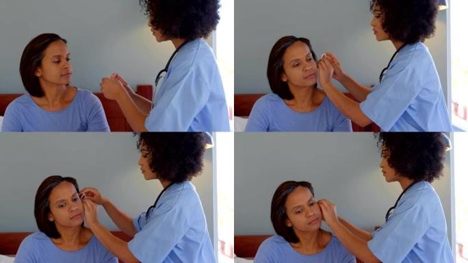 混血女医生在家里4k的女人耳朵上插入助听器