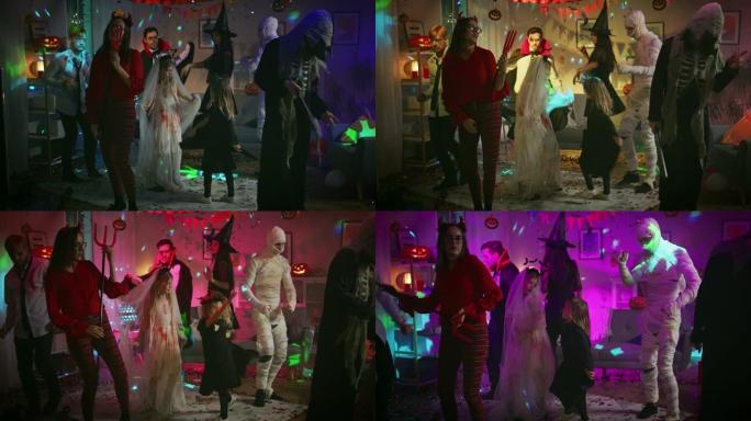 万圣节服装派对: 一群怪物在装饰有迪斯科球灯的房间里跳舞。僵尸，吸血鬼，木乃伊，美丽的女巫，她的魔鬼