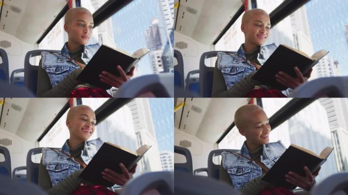 混血女人坐公共汽车看书