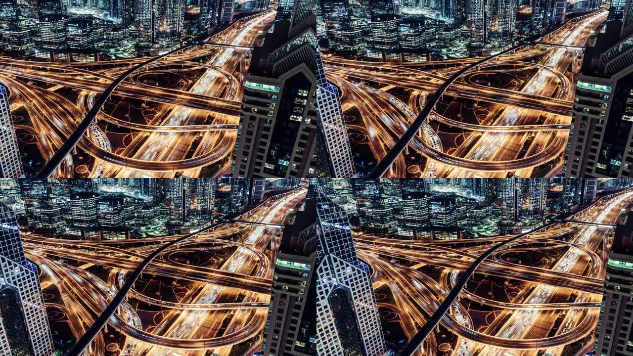 阿联酋迪拜夜间地铁和城市交通的T/L PAN鸟瞰图