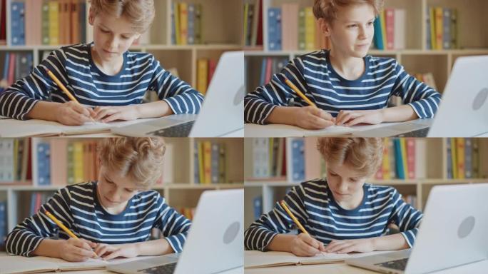 聪明的小男孩使用笔记本电脑进行学习，写下有用的信息。远程学习、电子教育、电子学习、家庭教育概念。男孩