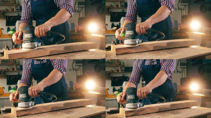 男人用抛光机在木片上工作。