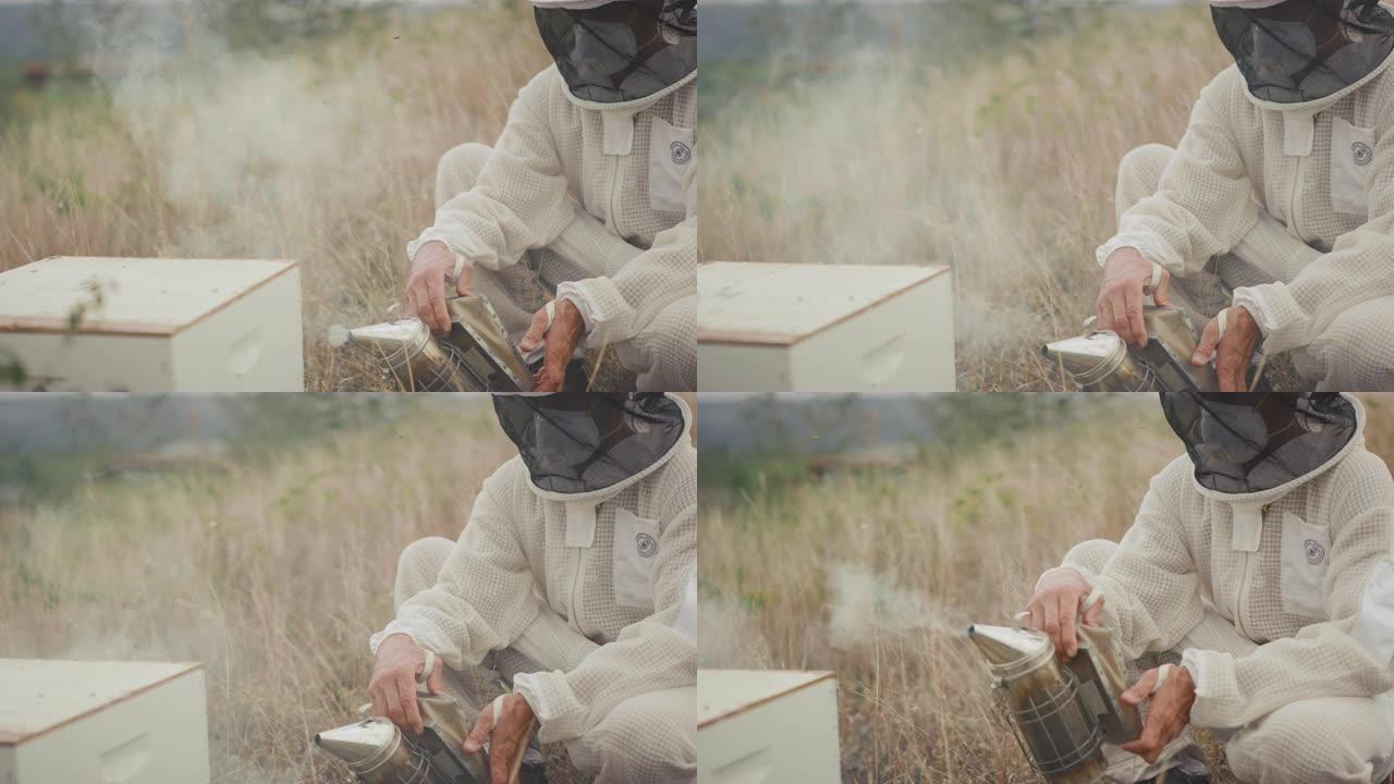 养蜂人用烟雾使蜜蜂平静下来
