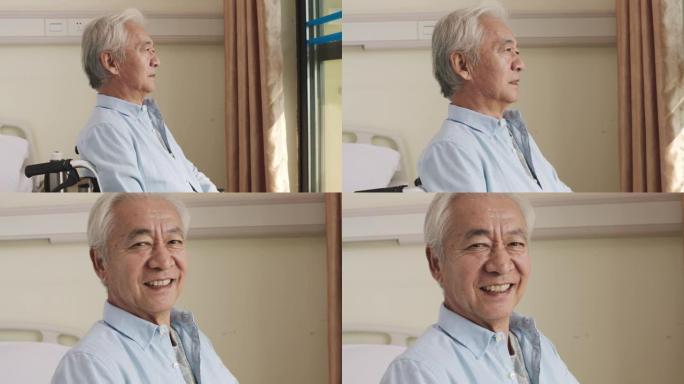 亚洲轮椅上的老人转向镜头微笑