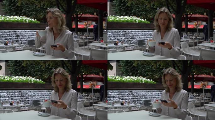 Beautiful woman enjoying a cup of coffee at a cafe