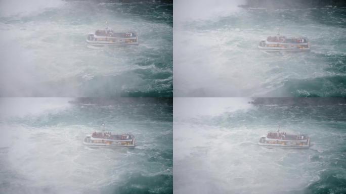 尼亚加拉瀑布8月17日2018旅游游览船的高角度视图靠近史诗喷雾瀑布慢动作。