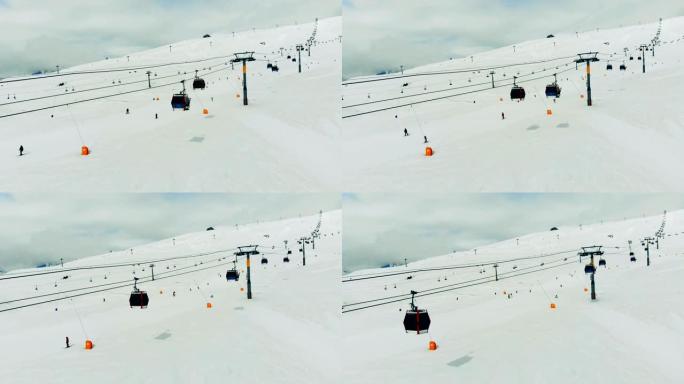 与索道和人一起滑雪