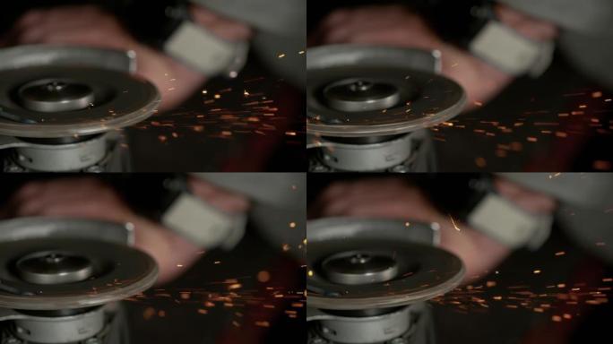 宏观: 角磨机打磨工件时火花飞出的详细镜头。