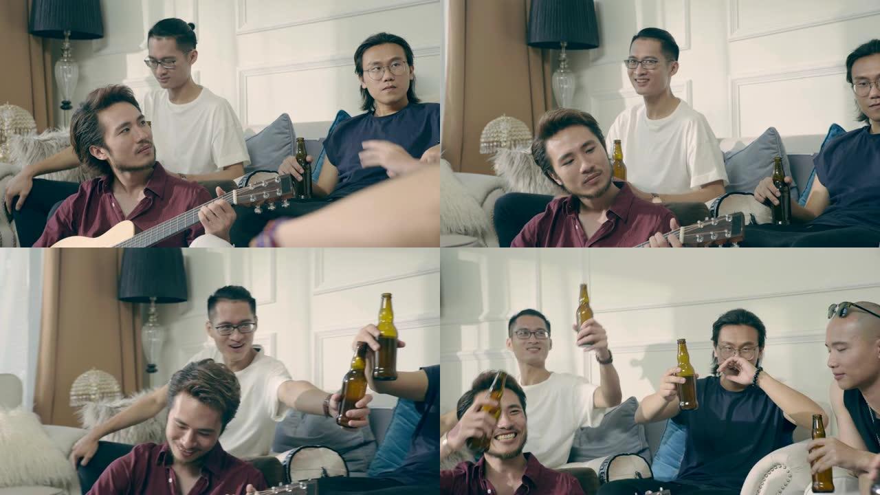 一群年轻的亚洲音乐家聚集在家里喝啤酒