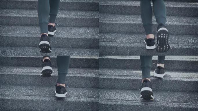 SLO MO年轻女子运动员在楼梯上奔跑