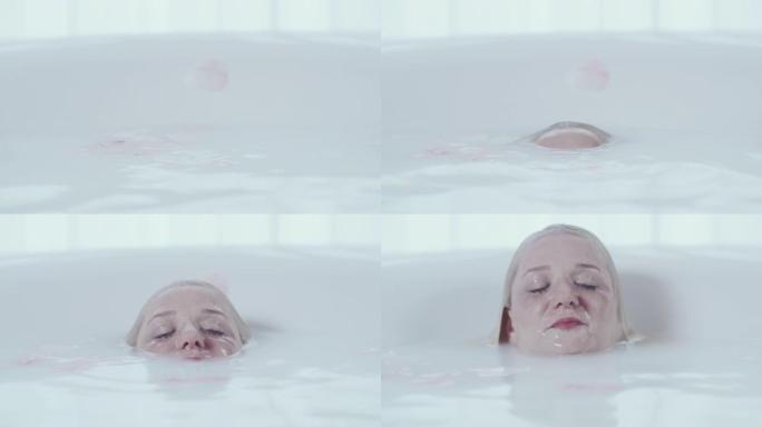 SLO MO女人泡在浴缸里