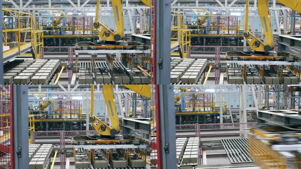 带输送机搬迁砖的现代工厂。装配线上的工业机器人。