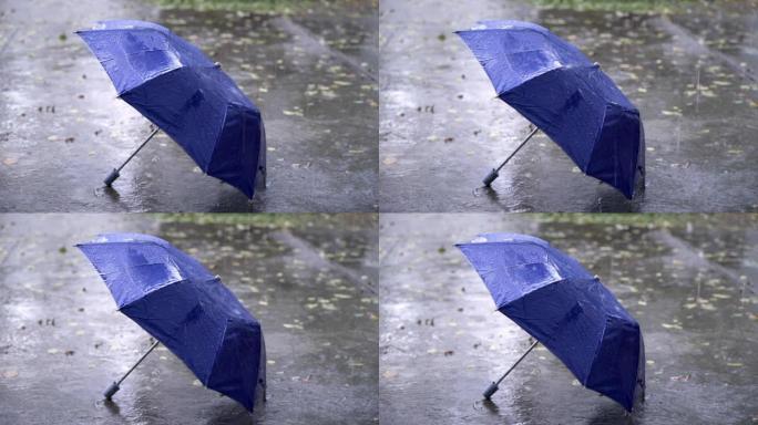 4k雨季，地板上有蓝色雨伞