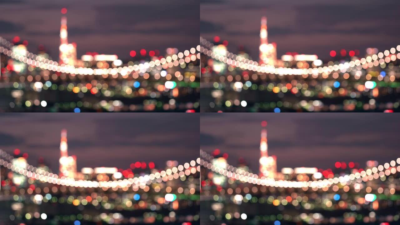 东京彩虹桥的抽象模糊背景鸟瞰图与日本东京铁塔在日落