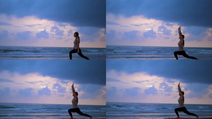 女人在海滩上做瑜伽练习