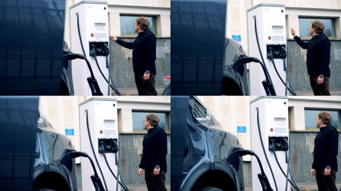 男子在车站与汽车充气机一起工作，特写镜头。
