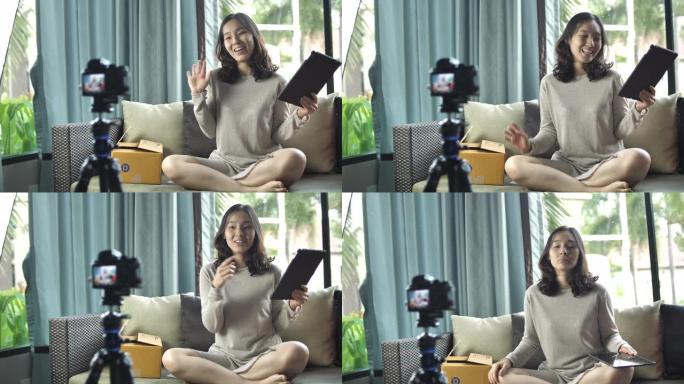 亚洲女性视频记录器对着镜头说话