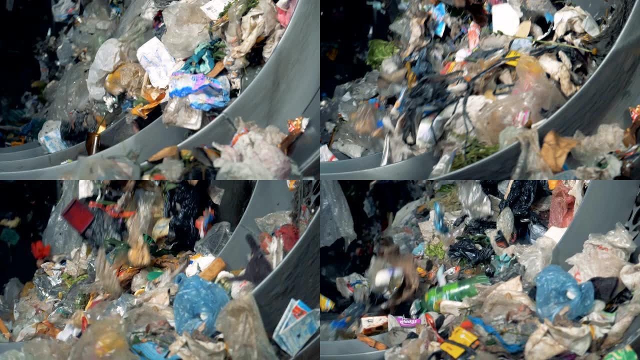 许多家庭垃圾在工厂被分类回收。4K。