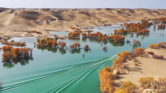 新疆鸟瞰图游艇划过水面沙漠新疆