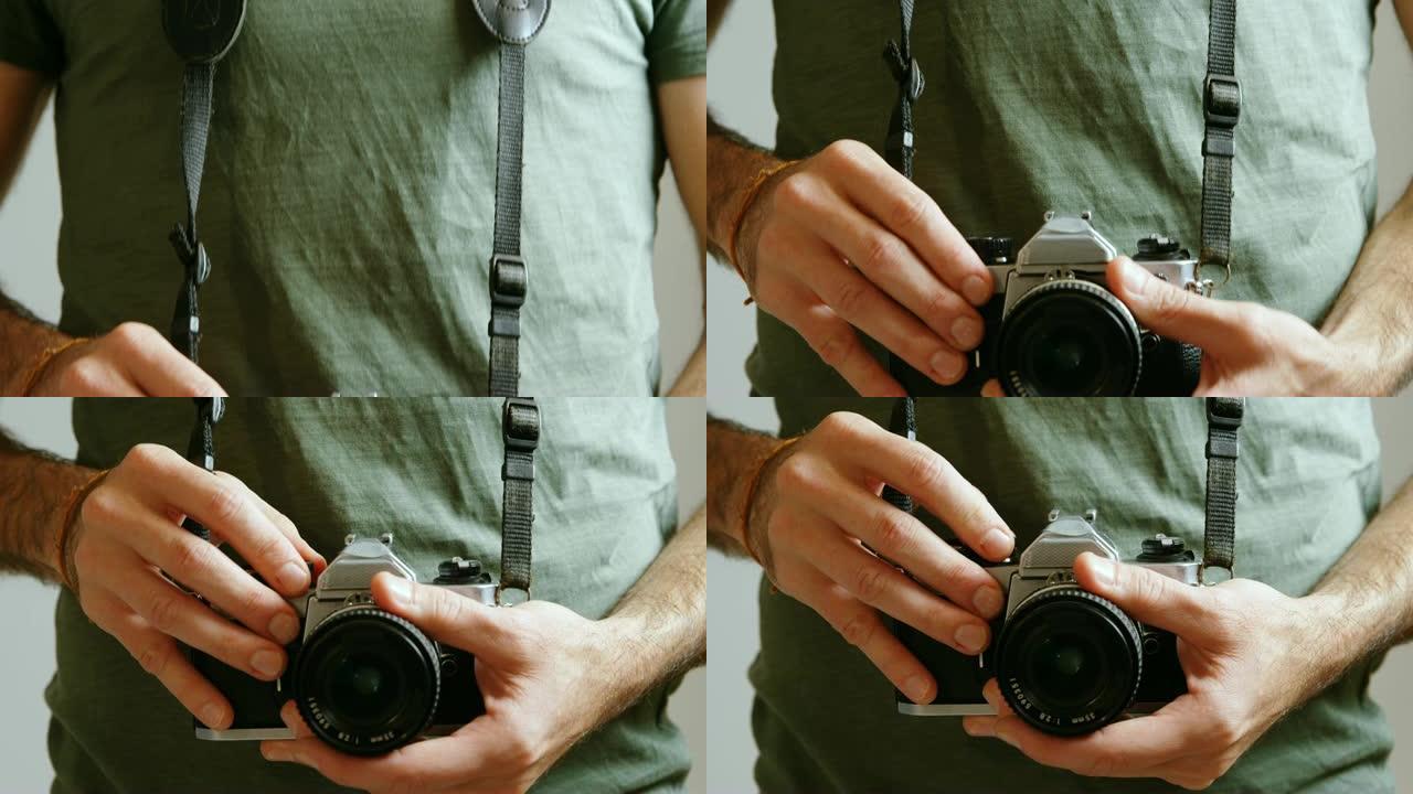 男性摄影师站在摄影棚4k的数码相机中