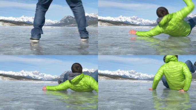 低角度: 无法辨认的人沿着冰冻的亚伯拉罕湖行走滑倒。