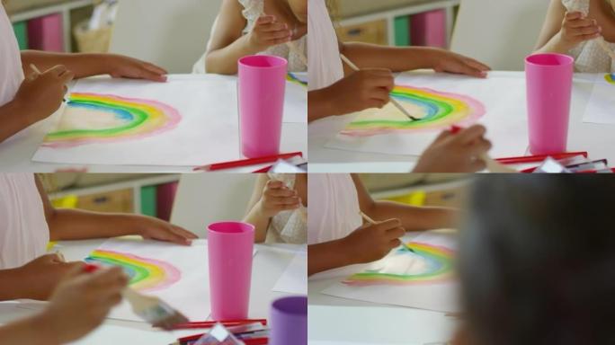 孩子们在美术课上画彩虹
