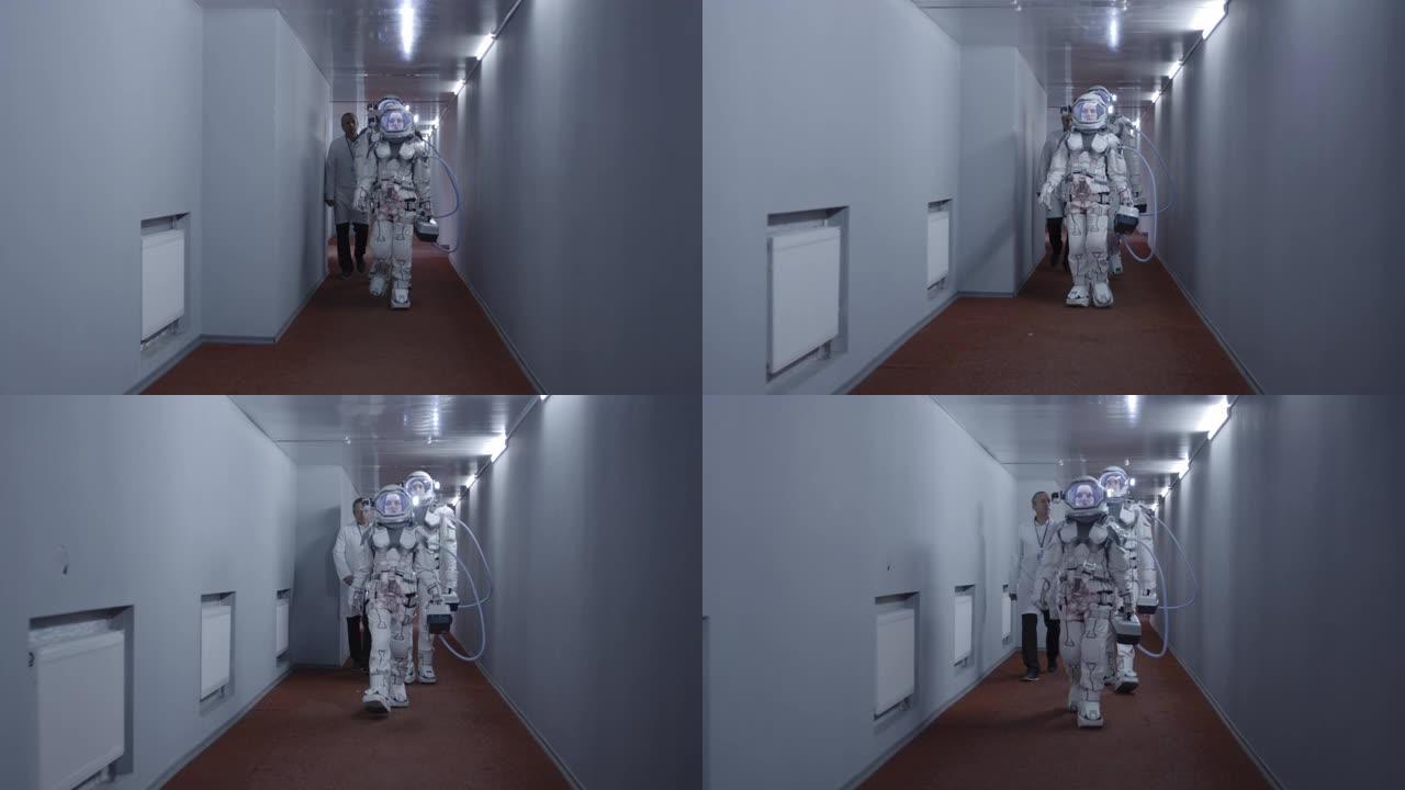 宇航员沿着走廊走外国宇航员走路特写镜头