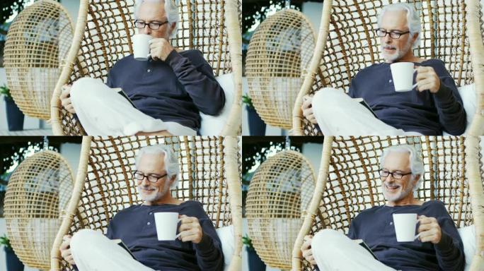 老人一边喝咖啡一边看书4k