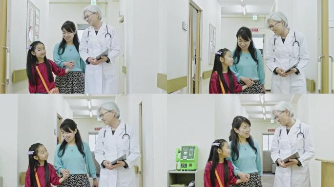女日本医生会见母子病人