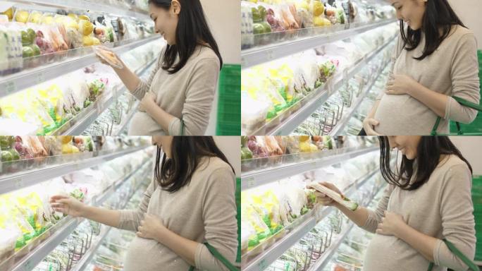 亚洲孕妇在超市购物