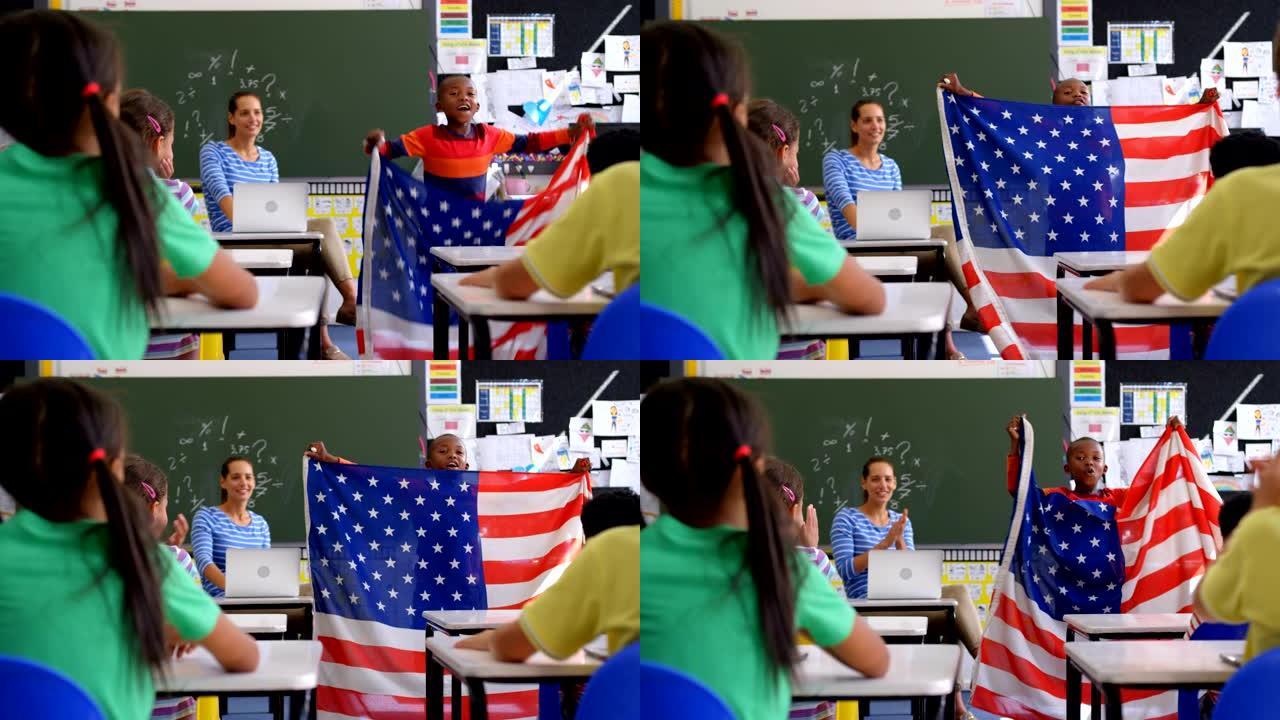 非裔美国男生在教室里解释美国国旗的前视图4k