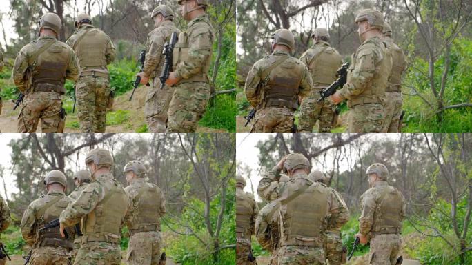 混合种族军事士兵在军事训练4k期间在野外进行步枪训练的后视图