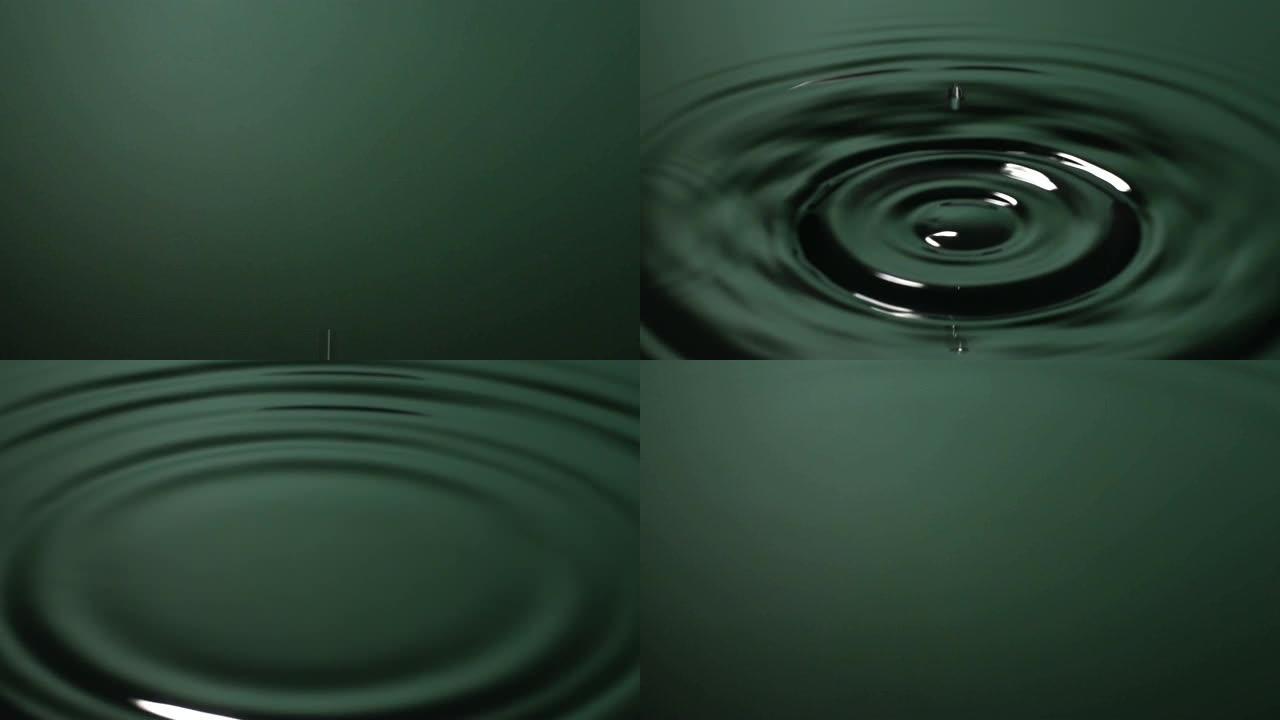 慢动作: 水滴变成绿色的水。