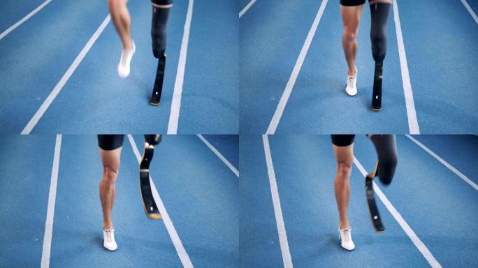 跑步者穿着假肢在赛道上热身。