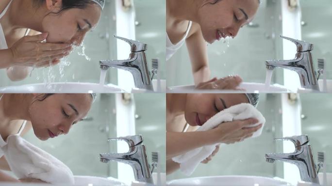 亚洲妇女在家浴室洗脸